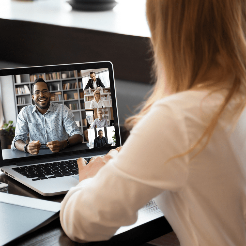 woman on video call with laptop